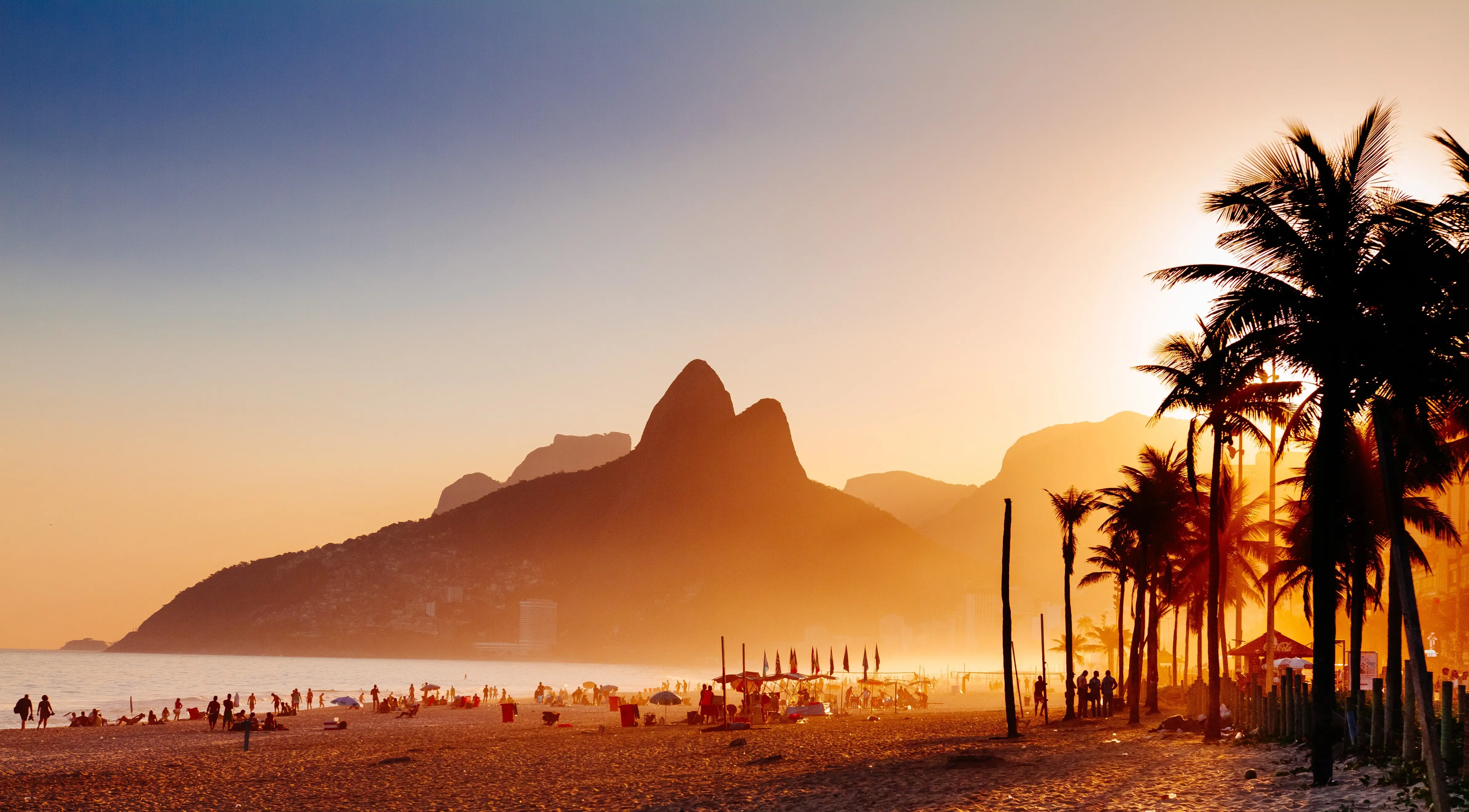 Rio de Janeiro beach sunset with palm trees